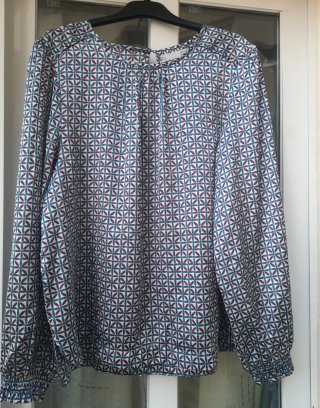 Blusa estampada manga larga