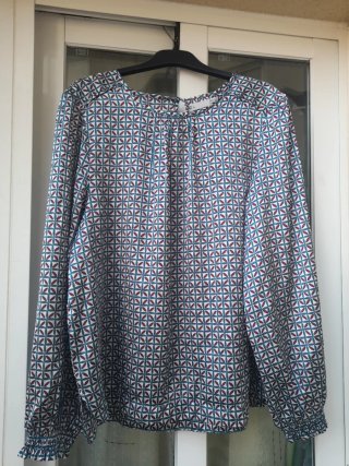 Blusa estampada manga larga