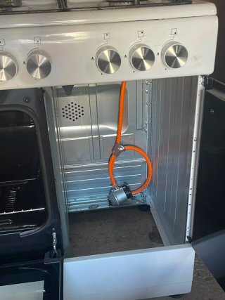 Cocina Corberó 5 fuegos gas butano con horno