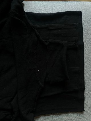 Jersey cuello alto negro borde tubular