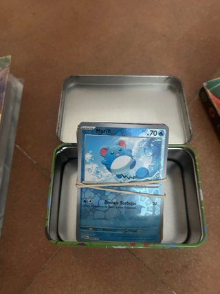 Álbumes y Cajas Pokémon