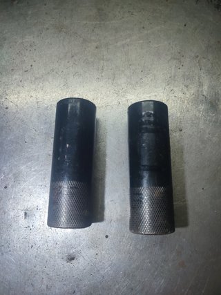Pareja de pegs BMX negros moleteados