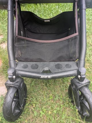 Silla de paseo Jane color naranja y gris