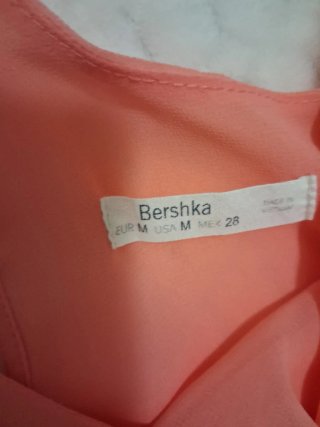 Blusa de tirantes color naranja pastel. Talla M.