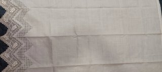 Textil antiguo de lino blanco vintage. Cortina