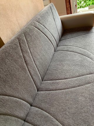 Divano letto contenitore grigio e bianco