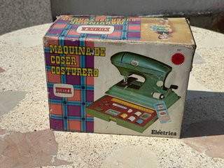 Máquina de coser Eureka eléctrica vintage