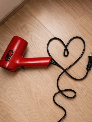 Secador de pelo rojo