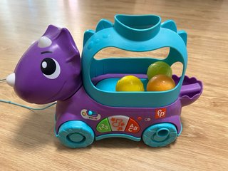 Dinosaurio Fisher Price con pelotas