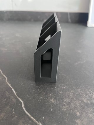 Organizador de mandos adhesivo