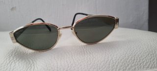 Gafas de sol Gucci doradas y verdes