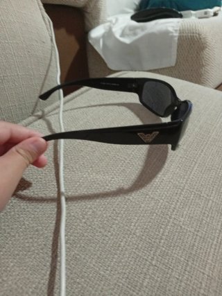 Gafas de sol negras como nuevas