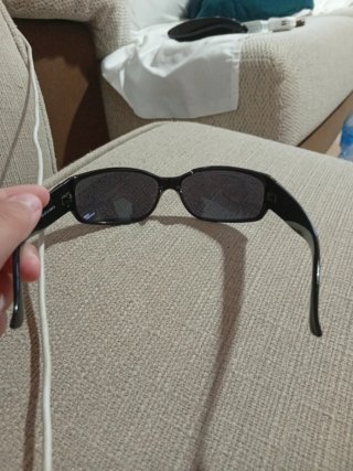 Gafas de sol negras como nuevas