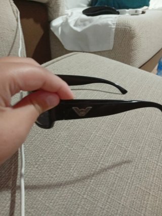 Gafas de sol negras como nuevas