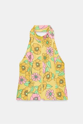 Top con estampado floral y cremallera. Solo envío