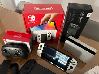 Nintendo Switch OLED Blanca + Juegos + accesorios