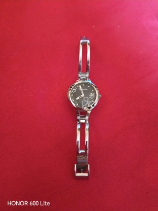 Reloj Kimio plateado con flores