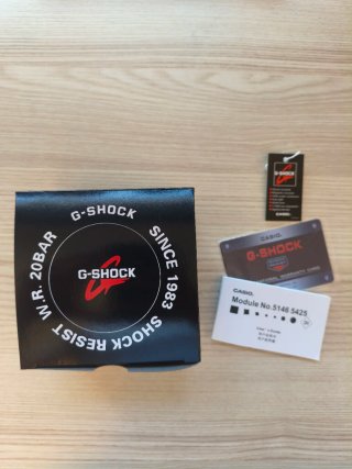 Reloj Casio G-Shock Naranja y Plateado