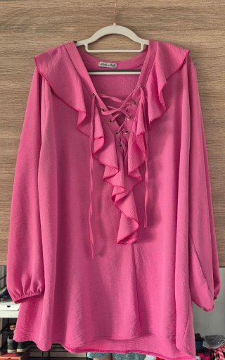 Blusa rosa con cordones