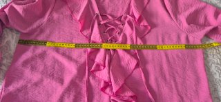 Blusa rosa con cordones