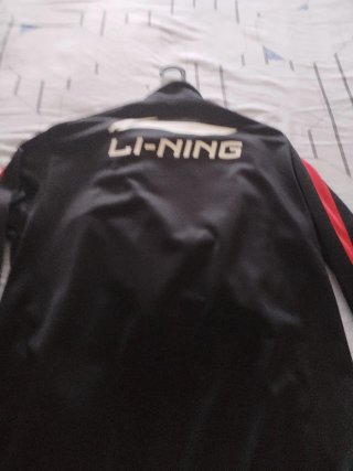 Chándal Sevilla FC Li-Ning Negro Naranja