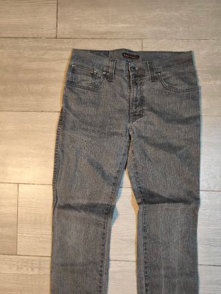 Pantalón Nudie Jeans Slim Jim Gris