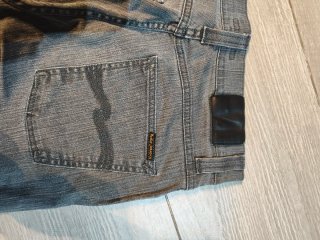 Pantalón Nudie Jeans Slim Jim Gris
