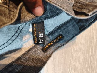 Pantalón Nudie Jeans Slim Jim Gris