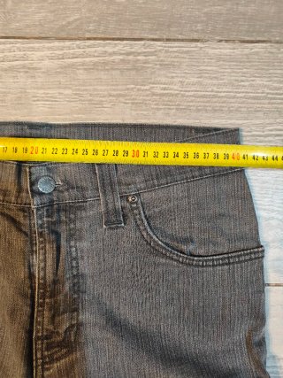 Pantalón Nudie Jeans Slim Jim Gris