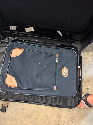 Maletas de viaje azul y beige