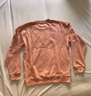 Sudadera rosa con estampado