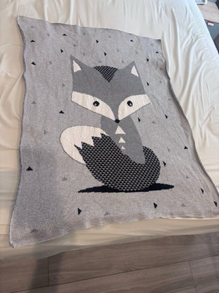 Manta bebé zorro gris