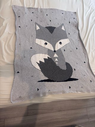 Manta bebé zorro gris