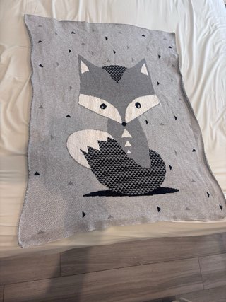 Manta bebé zorro gris