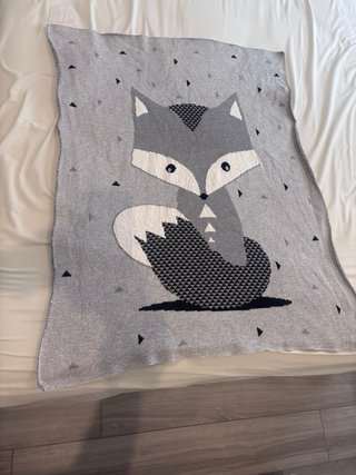 Manta bebé zorro gris