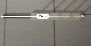 Percha extraíble para armario