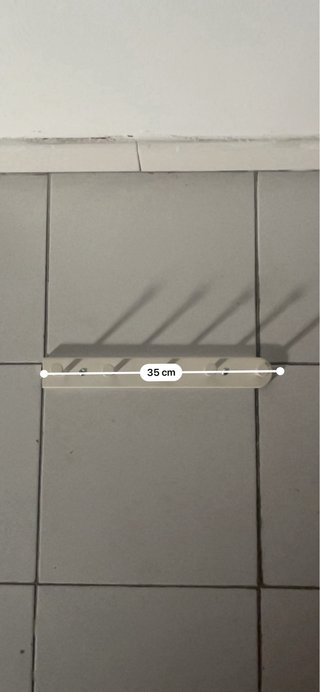 Percha extraíble para armario