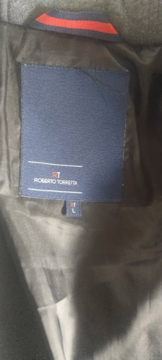 Chaqueta Roberto Torreta acolchada gris y negra