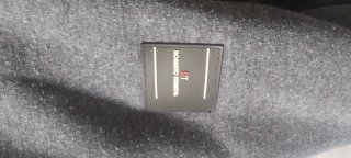 Chaqueta Roberto Torreta acolchada gris y negra