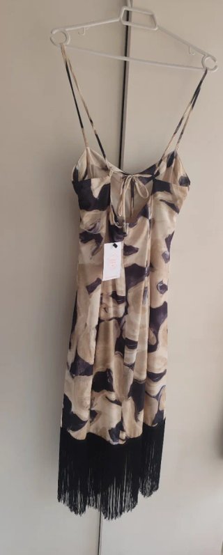 Vestido estampado con flecos