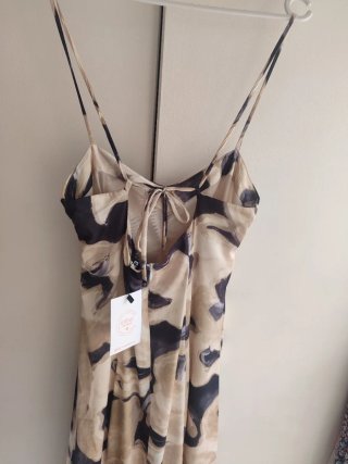Vestido estampado con flecos