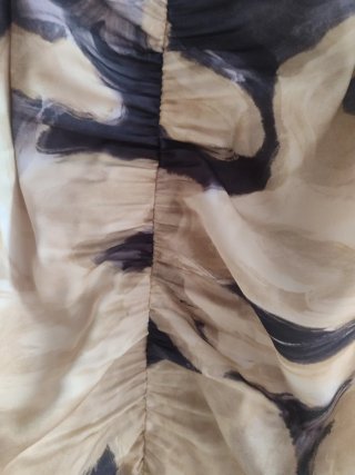 Vestido estampado con flecos