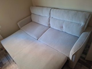 Sofá cama 3 plazas beige nuevo.