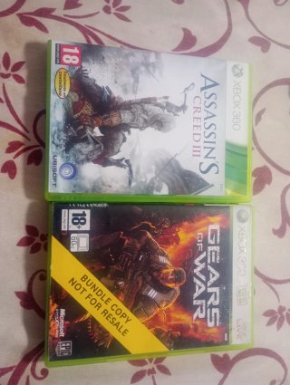 2 Juegos Xbox 360: Assassin's Creed III y Gears of