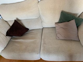 Sofá de tela beige extensible