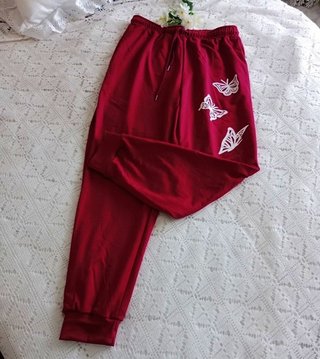 Pantalón de chándal rojo con mariposas T L