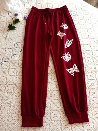 Pantalón de chándal rojo con mariposas T L