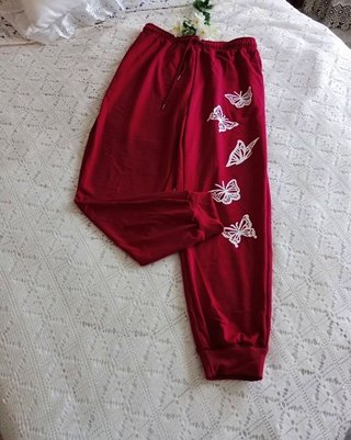Pantalón de chándal rojo con mariposas T L