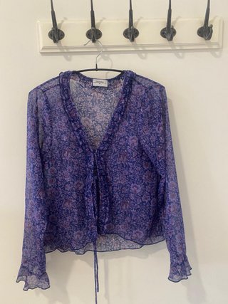 Blusa floral transparente
