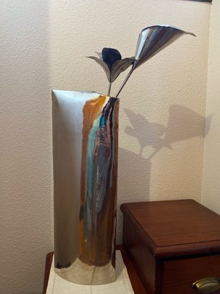 Adorno floral metal cromado